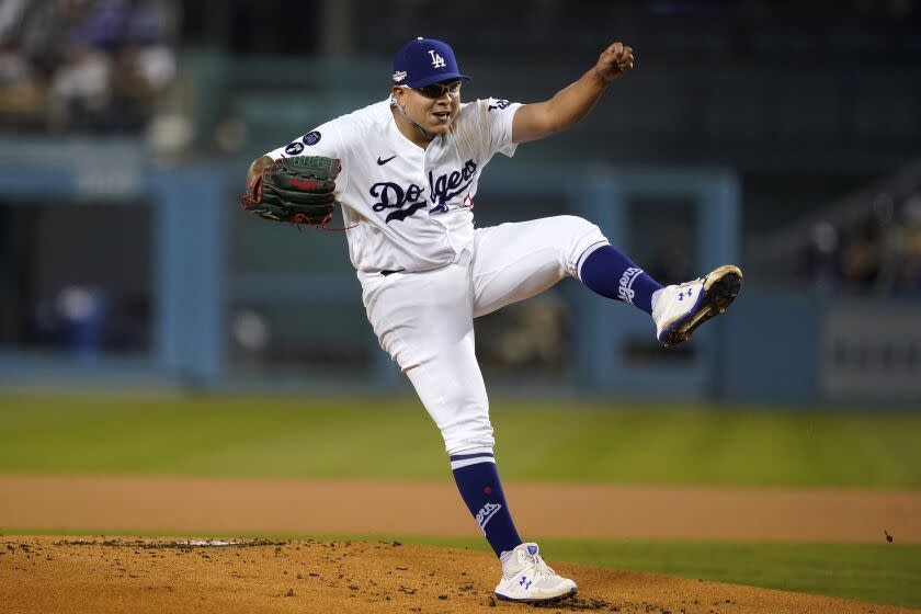 Los Angeles Dodgers starting pitcher Julio Urias throws to the plate during the first inning in Game 1 of a baseball NL Division Series against the San Diego Padres Tuesday, Oct. 11, 2022, in Los Angeles. (AP Photo/Marcio Jose Sanchez)