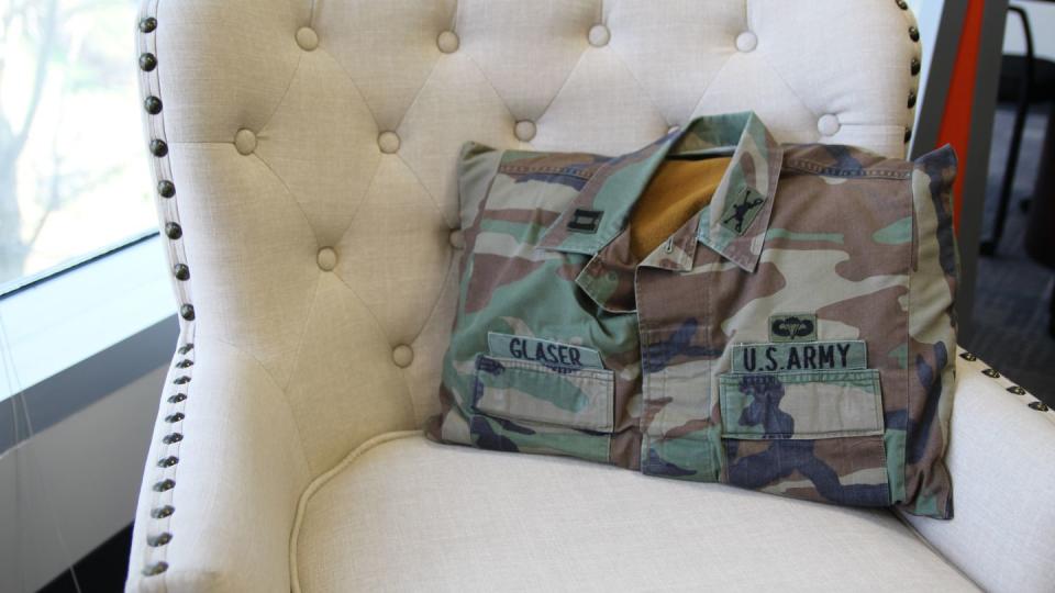 During his tenure as the brigade headquarters company commander in 2003, Brig. Gen. William Glaser’s mother was the unofficial seamstress for 2nd Brigade, 3rd Infantry Division. The company rolled into Iraq flying miniature guidons sewn by her, as was this pillowcase from an old battle dress uniform blouse seen sitting in his Orlando, Florida office on Feb. 23, 2023. (Staff/Davis Winkie)