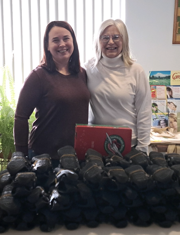 Tracy Stafford and Deb DeRing Heifner added a specialized pair of shoes in their shoeboxes as part of the international program called Operation Christmas Child.