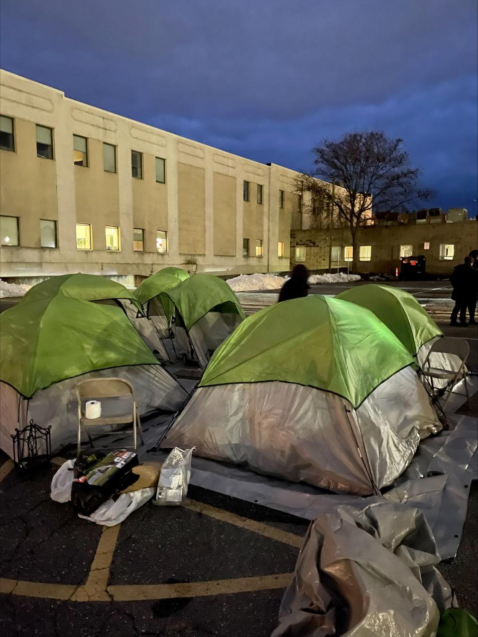 A cluster of tents outside the emergency winter shelter at the former Registry of Motor Vehicles building on Main Street in Worcester.