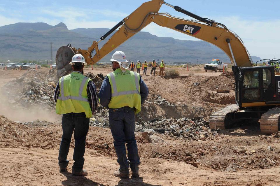 Workers monitor progress at the old Alamogordo landfill in search of buried Atari games in Alamogordo