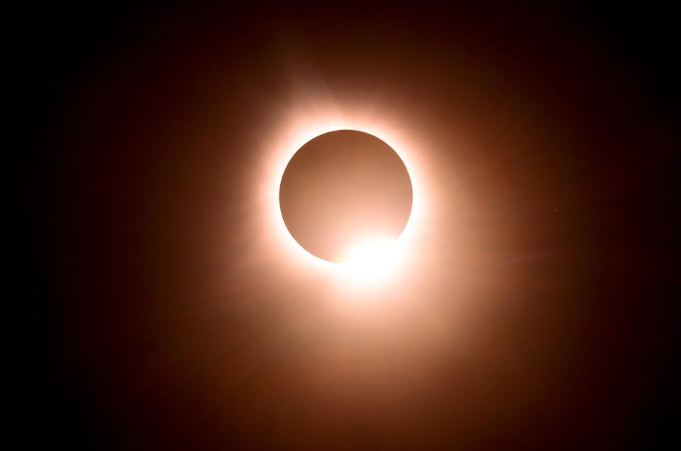 The moon eclipses the sun during a total solar eclipse across North America, in Bloomington, Indiana. <em>Photo by JOSH EDELSON / AFP</em>