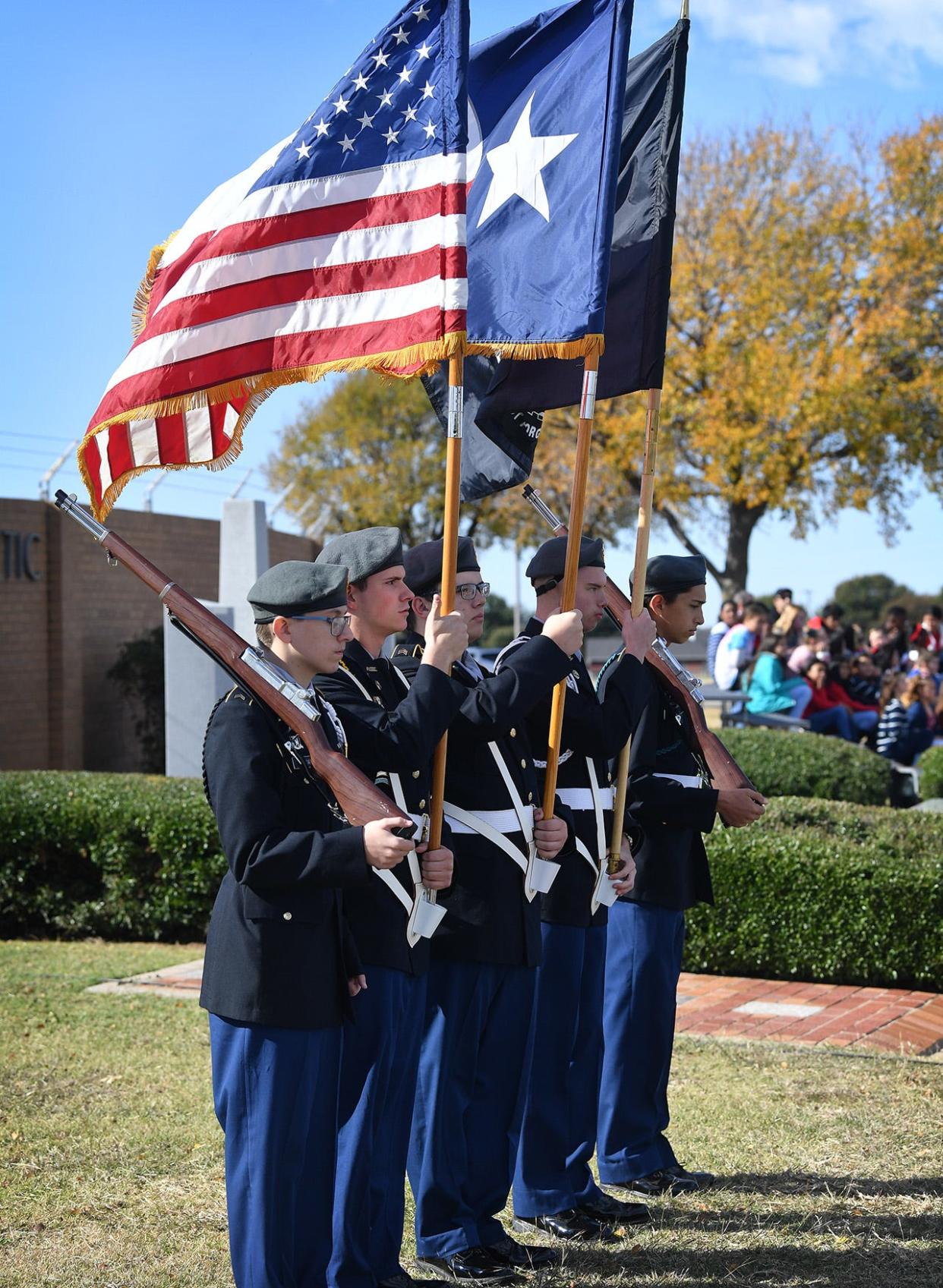In this 2021 photo, the color guard from the Rider High School JROTC served at the Wichita Falls ISD Veterans Day ceremony at Memorial Stadium. In honor of veterans, many area restaurants are offering free food and beverages for current and prior military members on Veterans Day, Nov. 11, 2022. 
(Photo: TORIN HALSEY/TIMES RECORD NEWS)