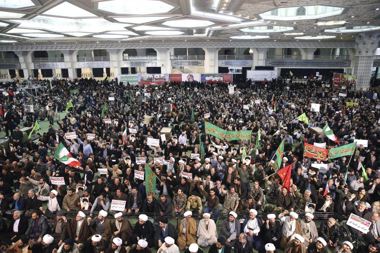 Iranian protesters chant slogans at a rally in Tehran, Iran: AP