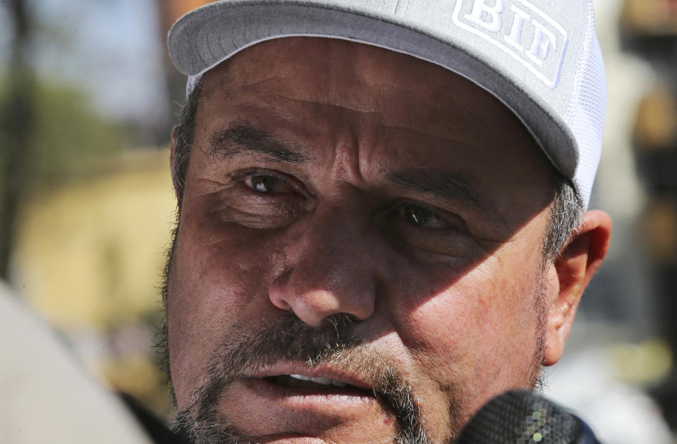 Adrian LeBaron, who lost relatives and friends in a Nov. 4, 2019 ambush in northern Mexico, talks with reporters after meeting with authorities at the office of the Special Prosecutor for Organized Crime Investigation in Mexico City, Tuesday, Jan. 7, 2020. Prosecutors said Tuesday more than 40 suspects have been identified in connection with the slaughter of the nine U.S. dual-national women and children. (AP Photo/Marco Ugarte)