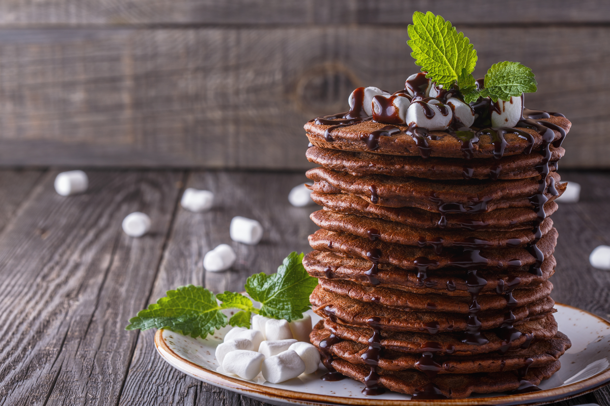 Chocolate pancakes with mint and marshmallows