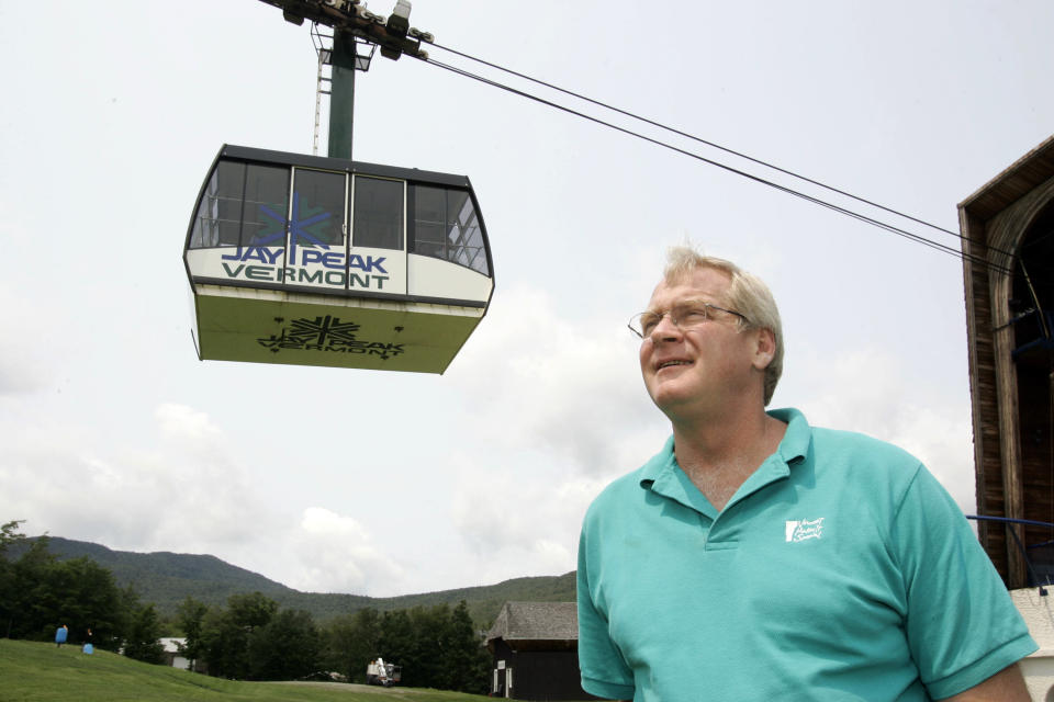 FILE - In this July 7, 2006 file photo, Jay Peak president Bill Stenger stands at the resort in Jay, Vt. The Vermont ski area near the Canadian border is willing to pay the U.S. Homeland Security Department to ensure there are enough customs agents at the border on weekends so that Canadian skiers don't have to wait. It's part of a pilot program taking place at certain ports of entry around the country. (AP Photo/Alden Pellett)
