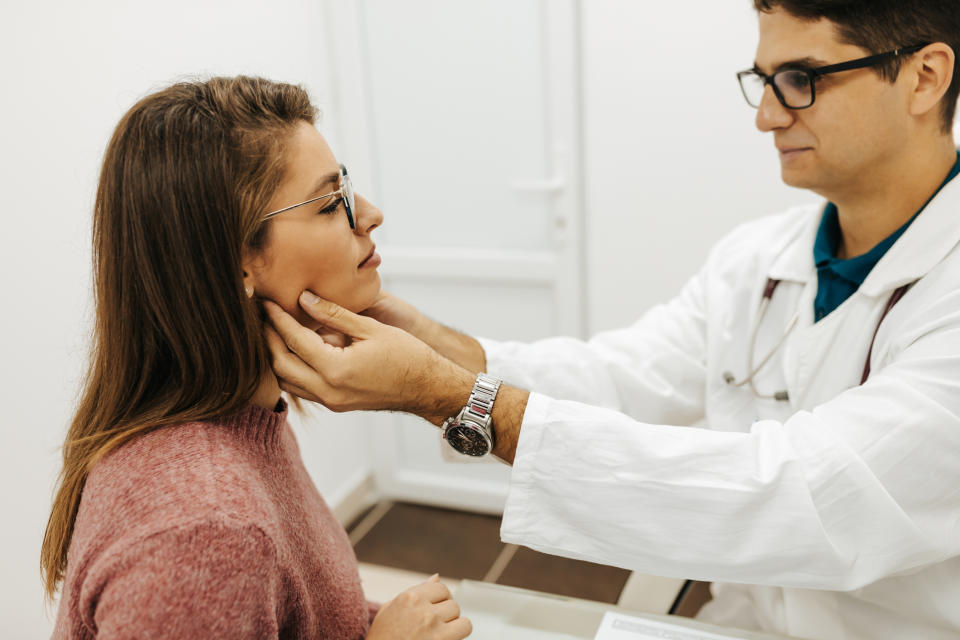 A doctor checking a patient