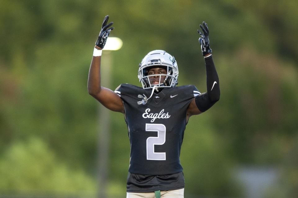 Zionsville High School junior Eugene Hilton (2) reacts after scoring during the first half of an IHSAA varsity football game against Hamilton Southeastern High School, Friday, Sept. 22, 2023, at Zionsville High School.