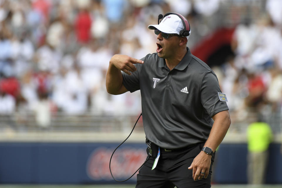 FILE - Troy head coach Jon Sumrall reacts during the first half an NCAA college football game against Mississippi in Oxford, Miss., Saturday, Sept. 3, 2022. The Trojans were 1-2 and reeling from a demoralizing loss on an Appalachian State Hail Mary. They haven’t lost since. (AP Photo/Thomas Graning, File)