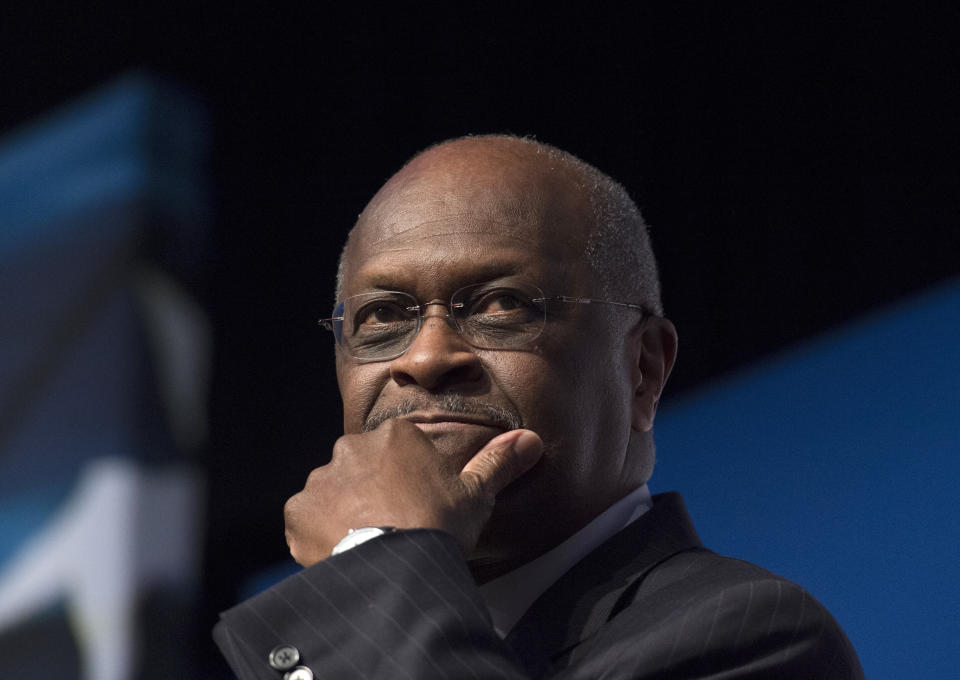 Herman Cain, pictured in 2014, rose to political prominence as a member of the Tea Party movement and ran for the Republican presidential nomination in 2012. (Photo: ASSOCIATED PRESS)