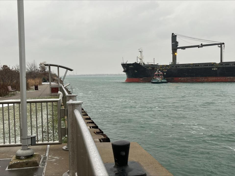 The freighter Barbro G sits near the Detroit RiverWalk on Monday after running aground earlier in the day.