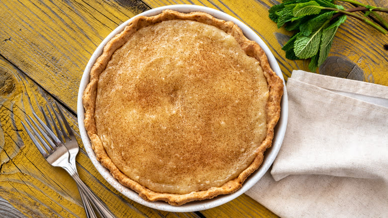 Sugar cream pie on wooden table