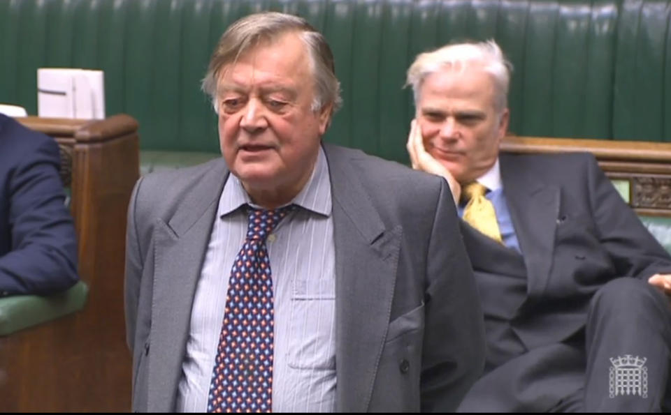 Sir Desmond Swayne MP sitting behind former Chancellor Ken Clarke as he speaks during a House of Commons debate on Brexit.