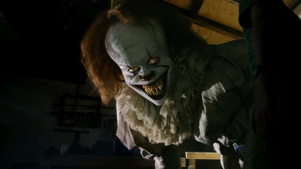  Pennywise leaps from a screen in IT  