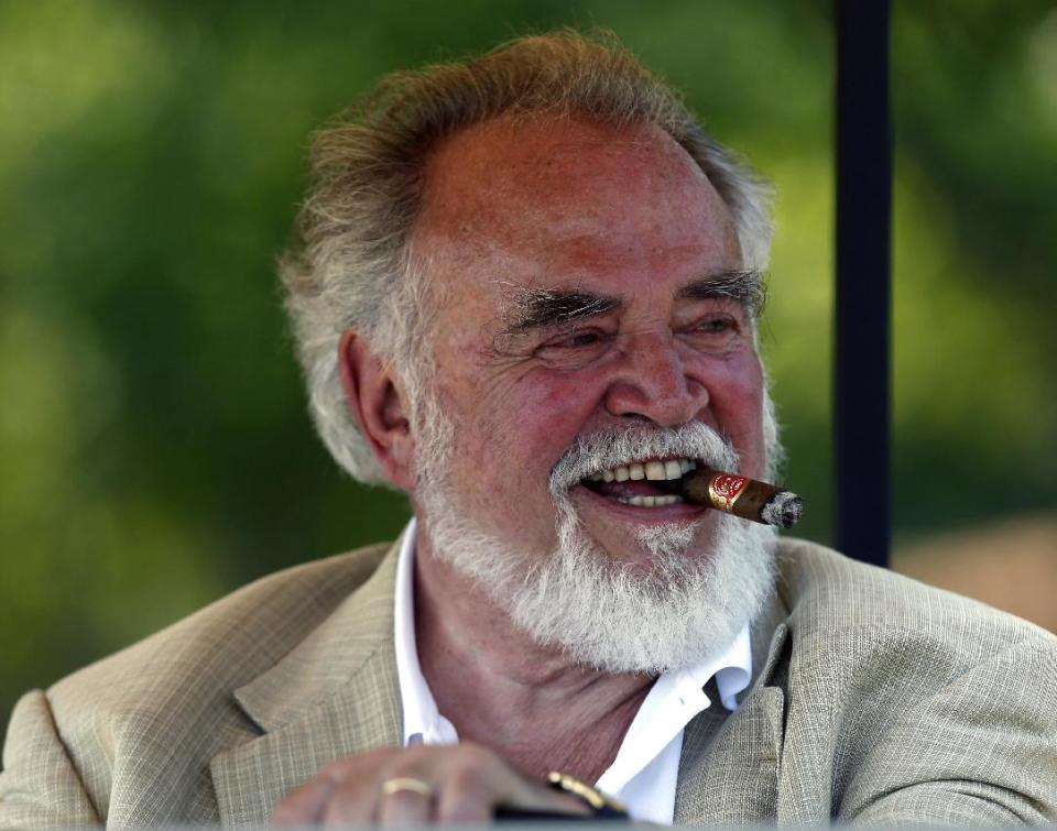 Herb Kohler Jr., president and chairman of the Kohler Company and owner of Blackwolf Run, watches from a golf cart on the 13th tee during the first round of the U.S. Women's Open golf tournament on Thursday, July 5, 2012, in Kohler, Wis. (AP Photo/Jeffrey Phelps)