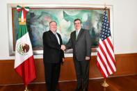 U.S Secretary of State Mike Pompeo shakes hands with Mexican Foreign Minister Marcelo Ebrard during a private meeting at the Foreign Ministry Building (SRE) in Mexico City