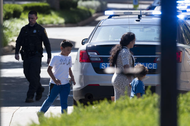 Tysons Corner Mall shooting: Cops hunt suspect after multiple shots fired  at shopping center forcing customers to flee