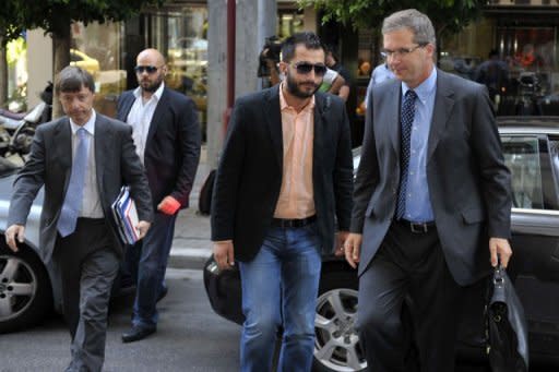 European Commission director Matthias Morse (L) and European Central Bank's representative Klaus Masuch (R) arrive for a meeting at the Finance Ministry in Athens. The IMF said on Thursday that it expected discussions with Greek authorities over the country's bailout-supported programme to continue into September