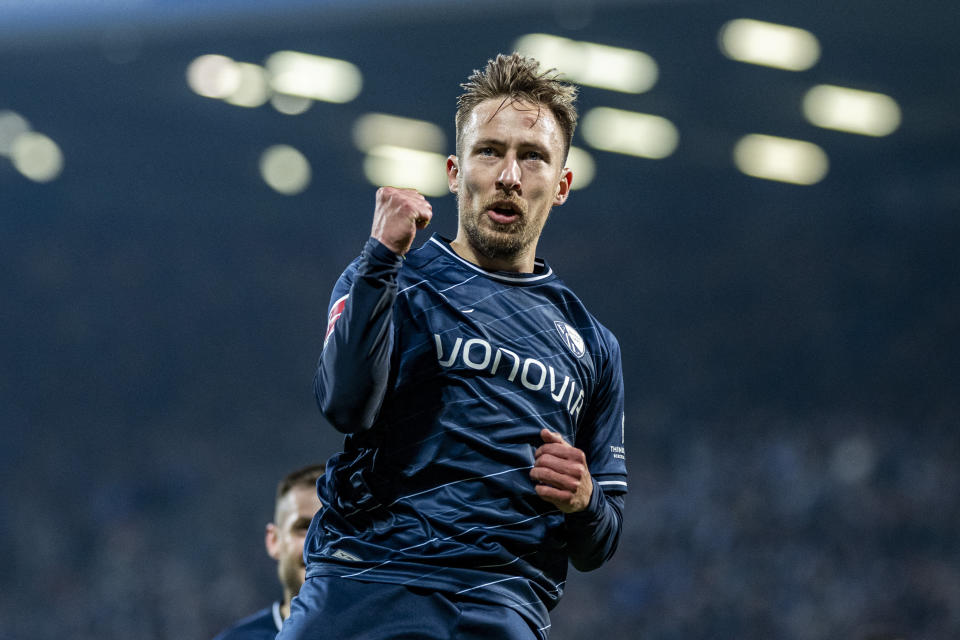 Bochum's Felix Passlack celebrates scoring during the Bundesliga soccer match between VfL Bochum and TSG 1899 Hoffenheim at Vonovia Ruhrstadion, Bochum, Germany, Friday April 26, 2024. (David Inderlied/dpa via AP)