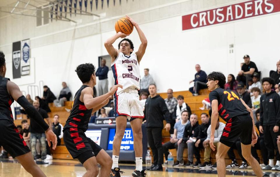 Modesto Christian’s Rashod Cotton attempts a jump shot during the game with Berkeley at Modesto Christian High School in Salida, Calif., Saturday, Dec. 16, 2023. 