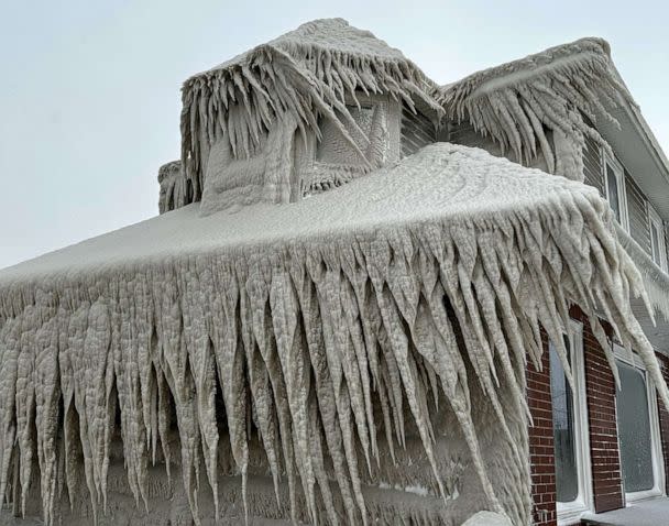 PHOTO: Hoak's restaurant is covered in ice from the spray of Lake Erie waves during a winter storm in Hamburg, New York, Dec. 24, 2022. (Kevin Hoak/Reuters)