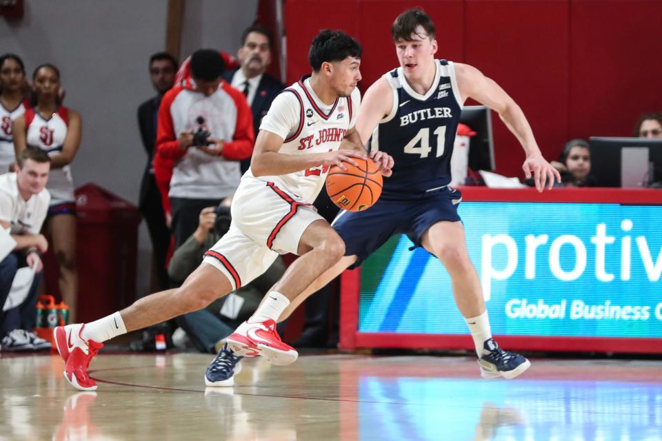 St. John's guard Rafael Pinzon drives past Butler guard Simas Lukosius during their game in January at Carnesecca Arena in Queens, N.Y.