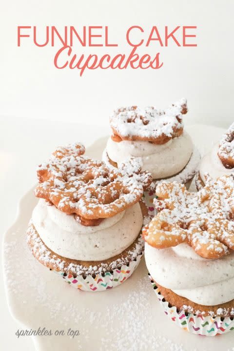 <p>A spiced vanilla cupcake with a cinnamon whipped cream topping? Delicious. All of that <em>plus</em> a mini funnel cake? Spectacular.</p><p><strong><a href="http://sprinklesontopreviews.com/2015/08/funnel-cake-cupcake-recipe/" rel="nofollow noopener" target="_blank" data-ylk="slk:Get the recipe at Sprinkles On Top.;elm:context_link;itc:0;sec:content-canvas" class="link ">Get the recipe at Sprinkles On Top.</a></strong></p>