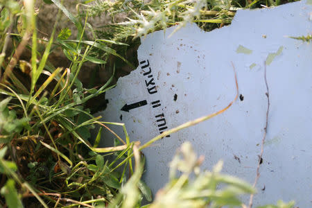 The remains of an Israeli drone are seen after it crashed in Beit Yahoun village, in southern Lebanon, March 31, 2018. REUTERS/ Hasan Shaaban