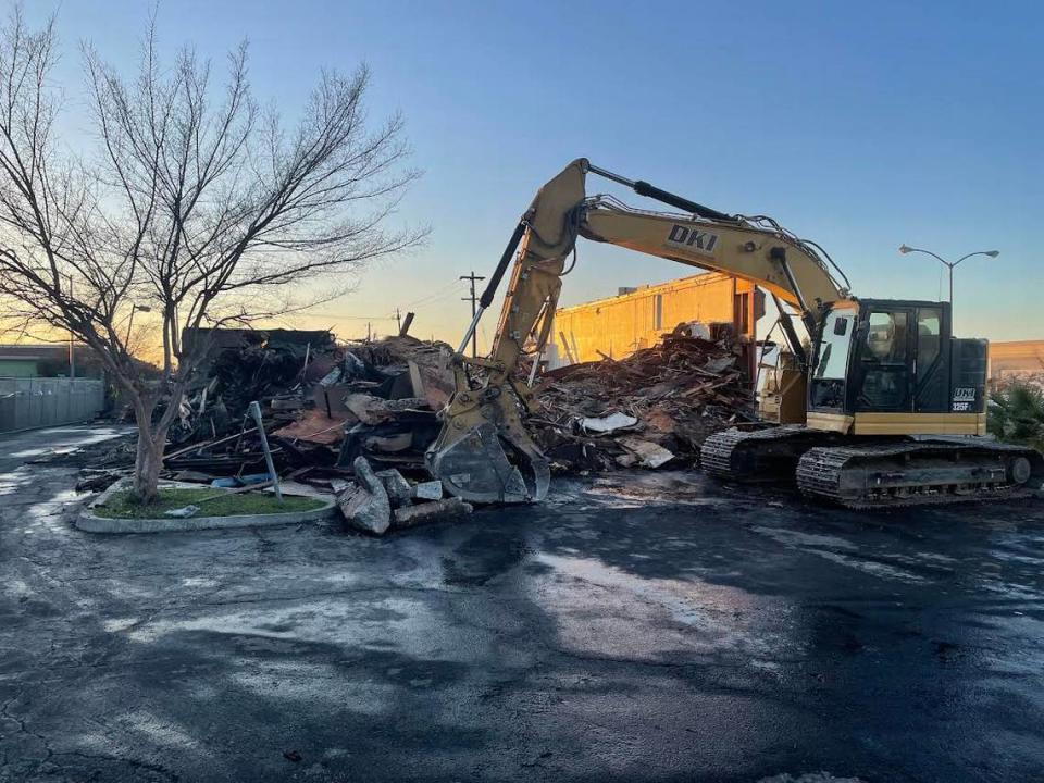 Crumpled steel girders, broken glass, and shattered wood were all that remained Monday, Jan. 30, 2023, after an overnight fire at the Fagbule Glass House on Shields Avenue near Highway 41 in Fresno.