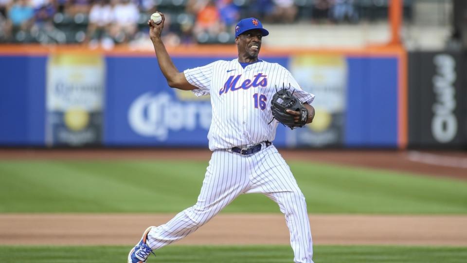 Aug 27, 2022; New York City, New York, USA; Former Major League Baseball pitcher Dwight Gooden pitches at the New York Mets Old Timers Day game at Citi Field.