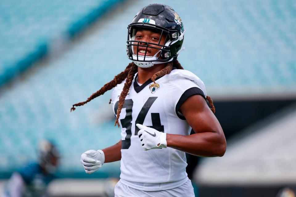 Jacksonville Jaguars cornerback Gregory Junior (34) smiles as he participates in an organized team activity Monday, June 6, 2022 at TIAA Bank Field in Jacksonville. 