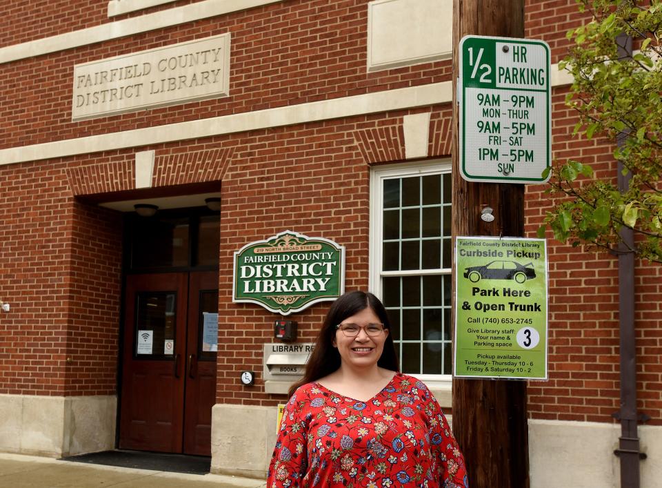 Fairfield County District Library Director Rebecca Schaade stands in front of the main library in this Eagle-Gazette file photo.