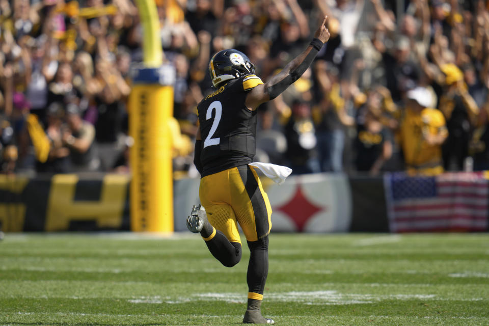 Pittsburgh Steelers quarterback Justin Fields celebrates after throwing a touchdown pass to wide receiver Calvin Austin III during the second half of an NFL football game against the Los Angeles Chargers, Sunday, Sept. 22, 2024, in Pittsburgh. (AP Photo/Gene J. Puskar)