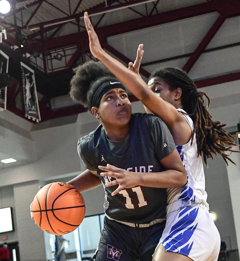 Westside junior Destiny Middleton dribbles near North Myrtle Beach junior Adaiah Vereen during the second quarter of the Class AAAA State Championship at USC Aiken in Aiken in March. Middleton signed to play basketball at Lander University.