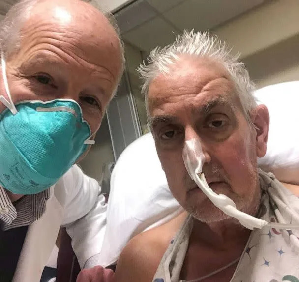 PHOTO: Dr. Bartley Griffith poses for a photo with patient David Bennett, Sr., right, who received a heart implant from a genetically modified pig, in Baltimore, in January 2022. (Univ. of Maryland School of Medicine via AFP/Getty Images)