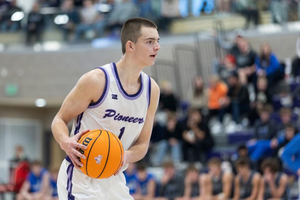 Cooper Lewis prepares to pass the ball during a game against Pleasant Grove at Lehi High School in Lehi on Friday, Jan. 26, 2024. Lehi won 77-61. | Marielle Scott, Deseret News