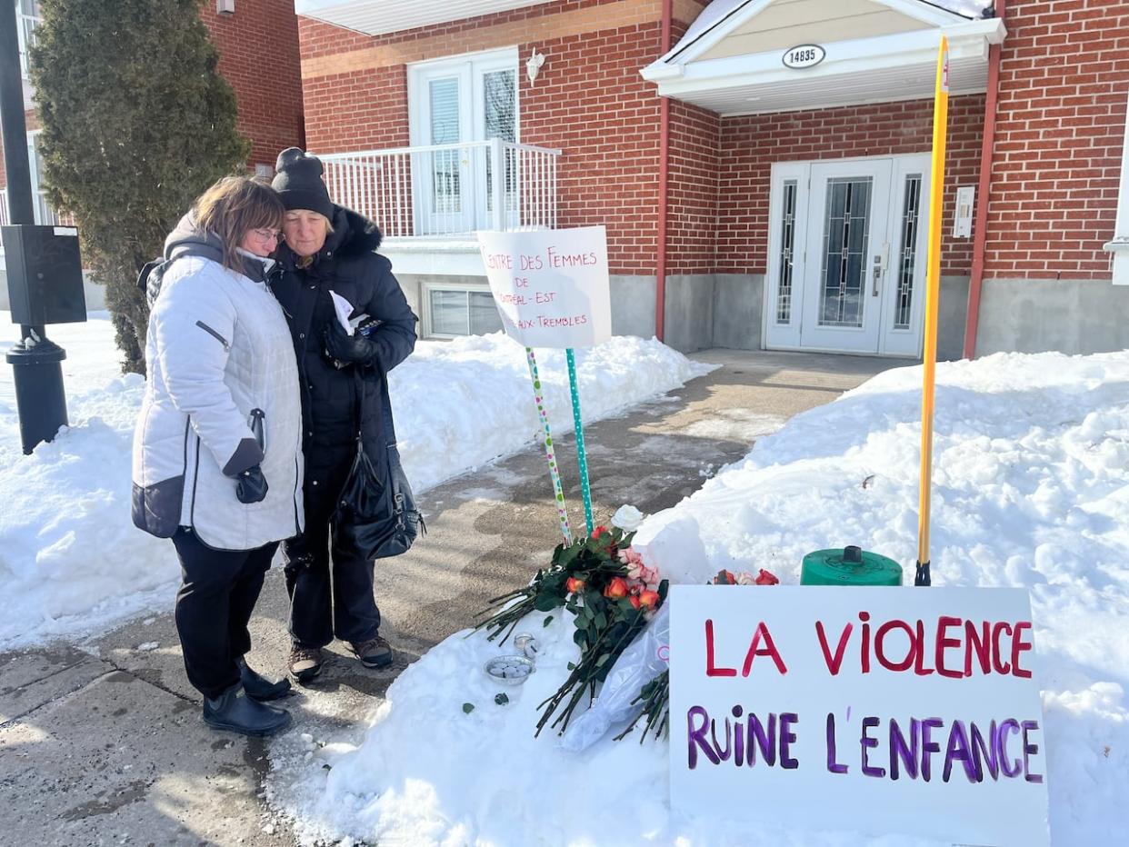 Patricia Higgins, right, and borough Coun. Lisa Christensen comfort each other during a vigil held to remember Narjess Ben Yedder, 32. (Mélissa François/CBC - image credit)