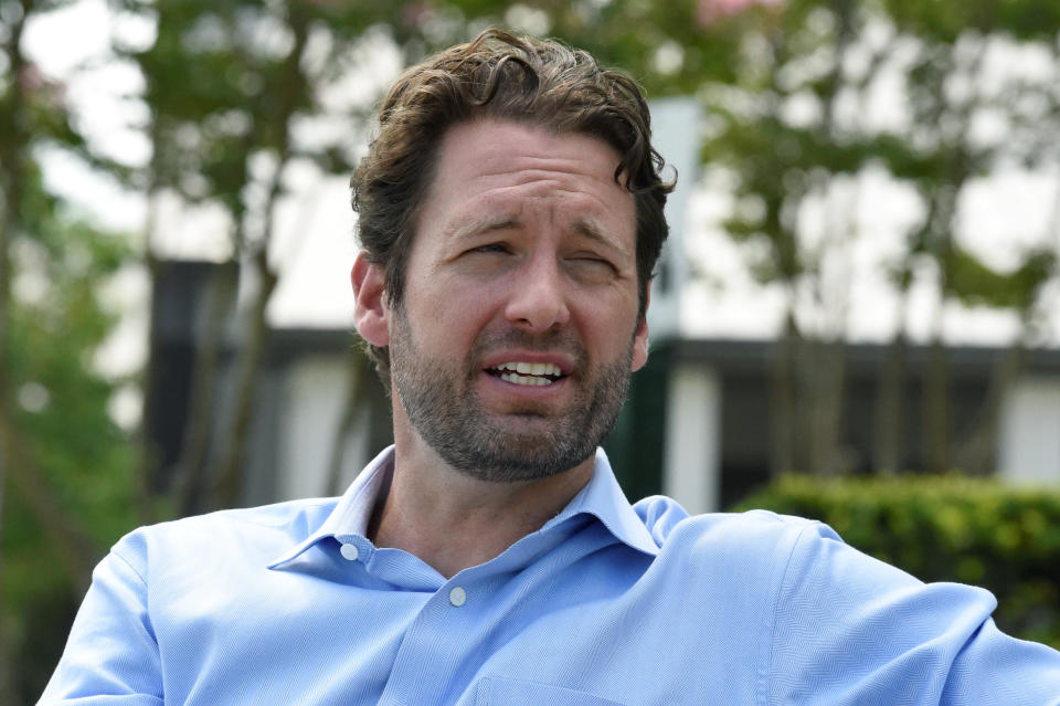 Former U.S. Rep. Joe Cunningham talks during an interview with The Associated Press about his campaign for South Carolina governor on Saturday, July 10, 2021, in Mount Pleasant, S.C. Cunningham says he wants to legalize marijuana in South Carolina, something he says would provide healthcare options, create jobs and generate millions in revenue for the state. (AP Photo/Meg Kinnard)