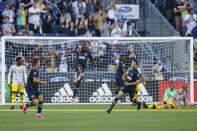 Philadelphia Union's Jamiro Monteiro. center, leaps as he celebrates his goal during the first half of an MLS soccer match against the Columbus Crew, Wednesday, June 23, 2021, in Chester, Pa. (AP Photo/Chris Szagola)