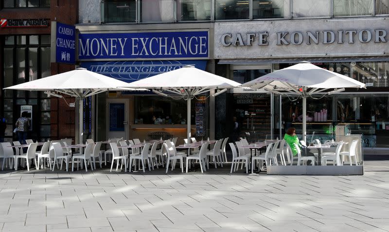 A customer sits in a cafe in Vienna