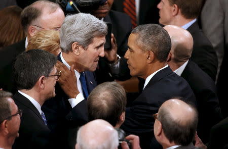 U.S. President Barack Obama speaks to U.S. Secretary of State John Kerry (2nd L) as Treasury Secretary Jack Lew (L) looks on after Obama completed his final State of the Union address to a joint session of Congress in Washington January 12, 2016. REUTERS/Jonathan Ernst