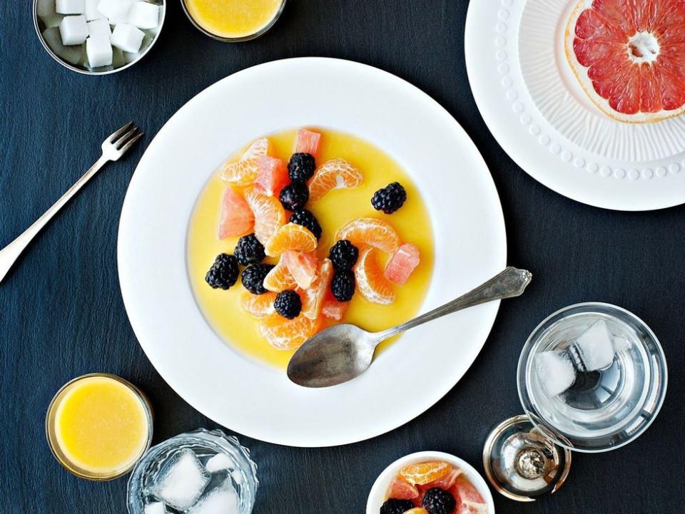 breakfast in bed fruit salad with grapefruit oranges blackberries