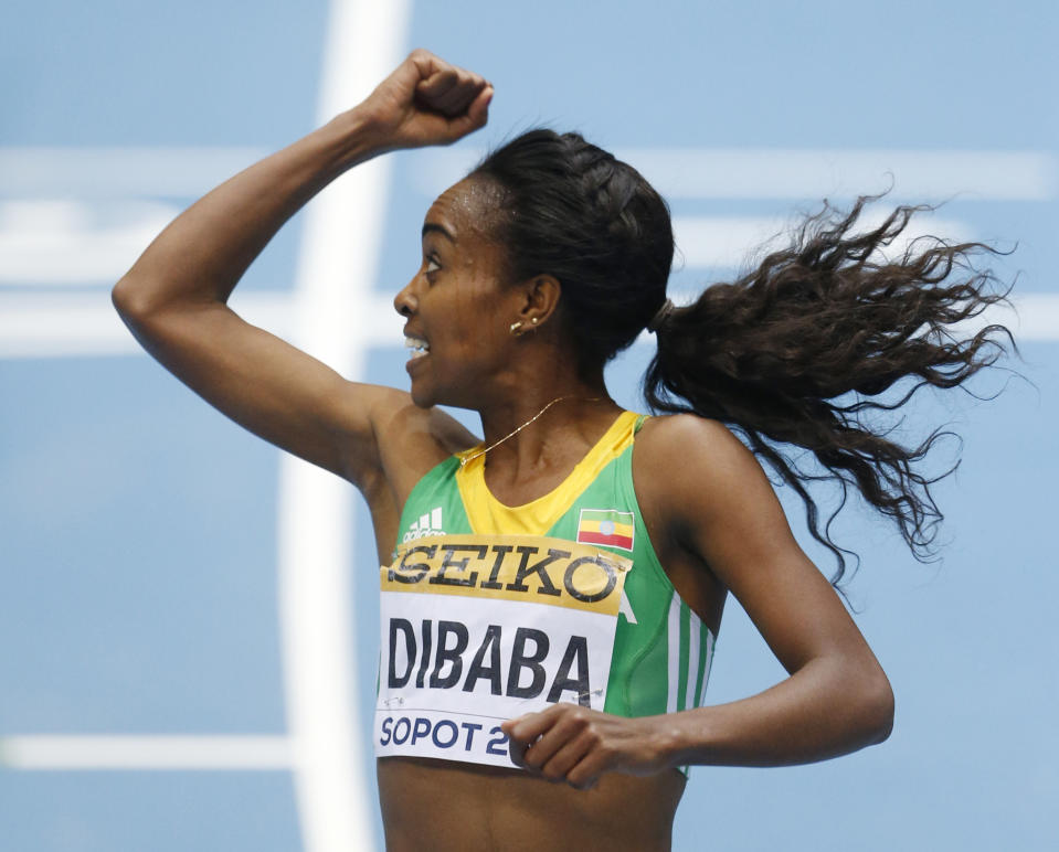 Ethiopia's Genzebe Dibaba crosses the finish line to win the 3000m final during the Athletics World Indoor Championships in Sopot, Poland, Sunday, March 9, 2014. (AP Photo/Petr David Josek)