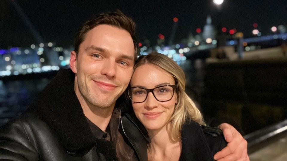 Nicholas Hoult and Bryana Holly posing for a selfie