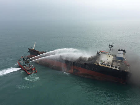 An oil tanker on fire is seen near Lamma island, Hong Kong, China January 8, 2019. Government Flying Service/Handout via REUTERS