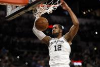 Nov 20, 2017; San Antonio, TX, USA; San Antonio Spurs power forward LaMarcus Aldridge (12) dunks the ball against the Atlanta Hawks during the second half at AT&T Center. Soobum Im-USA TODAY Sports