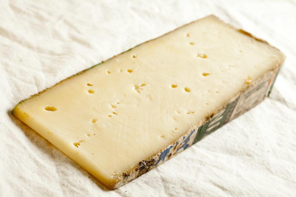 Fontina cheese also has ‘eyes.’ <a href="https://www.shutterstock.com/image-photo/italian-cheese-fontina-di-valle-d-523684417" rel="nofollow noopener" target="_blank" data-ylk="slk:Brian Yarvin/Shutterstock.com;elm:context_link;itc:0;sec:content-canvas" class="link ">Brian Yarvin/Shutterstock.com</a>