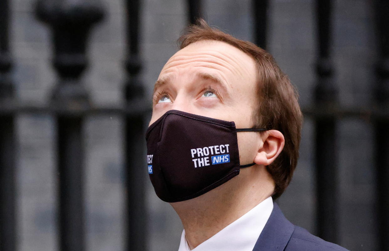 British Health Secretary Matt Hancock walks outside Downing Street in London, Britain, March 10, 2021. REUTERS/John Sibley