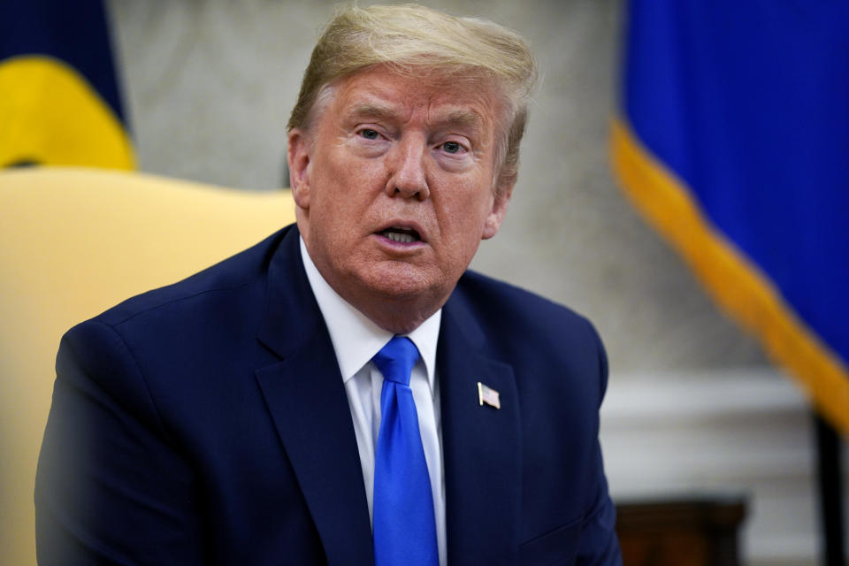 President Donald Trump speaks during a meeting with Gov. Kim Reynolds, R-Iowa, in the Oval Office of the White House, Wednesday, May 6, 2020, in Washington. (AP Photo/Evan Vucci)